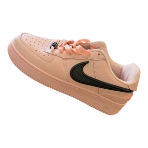 Nike Peach Low-Top Sneakers with Black Swoosh Accent